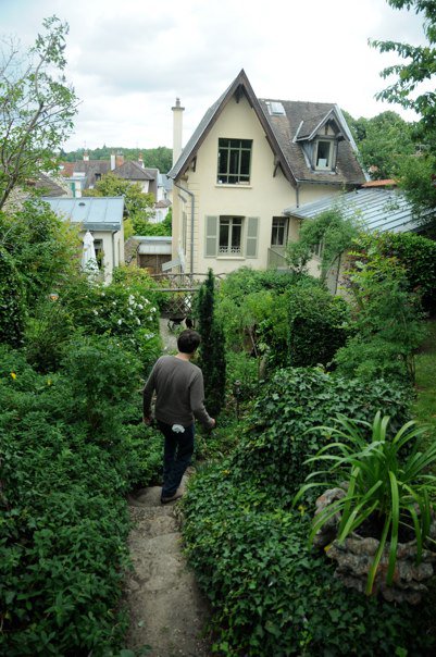 Xavier, the gardener of the family, walks to the house.
